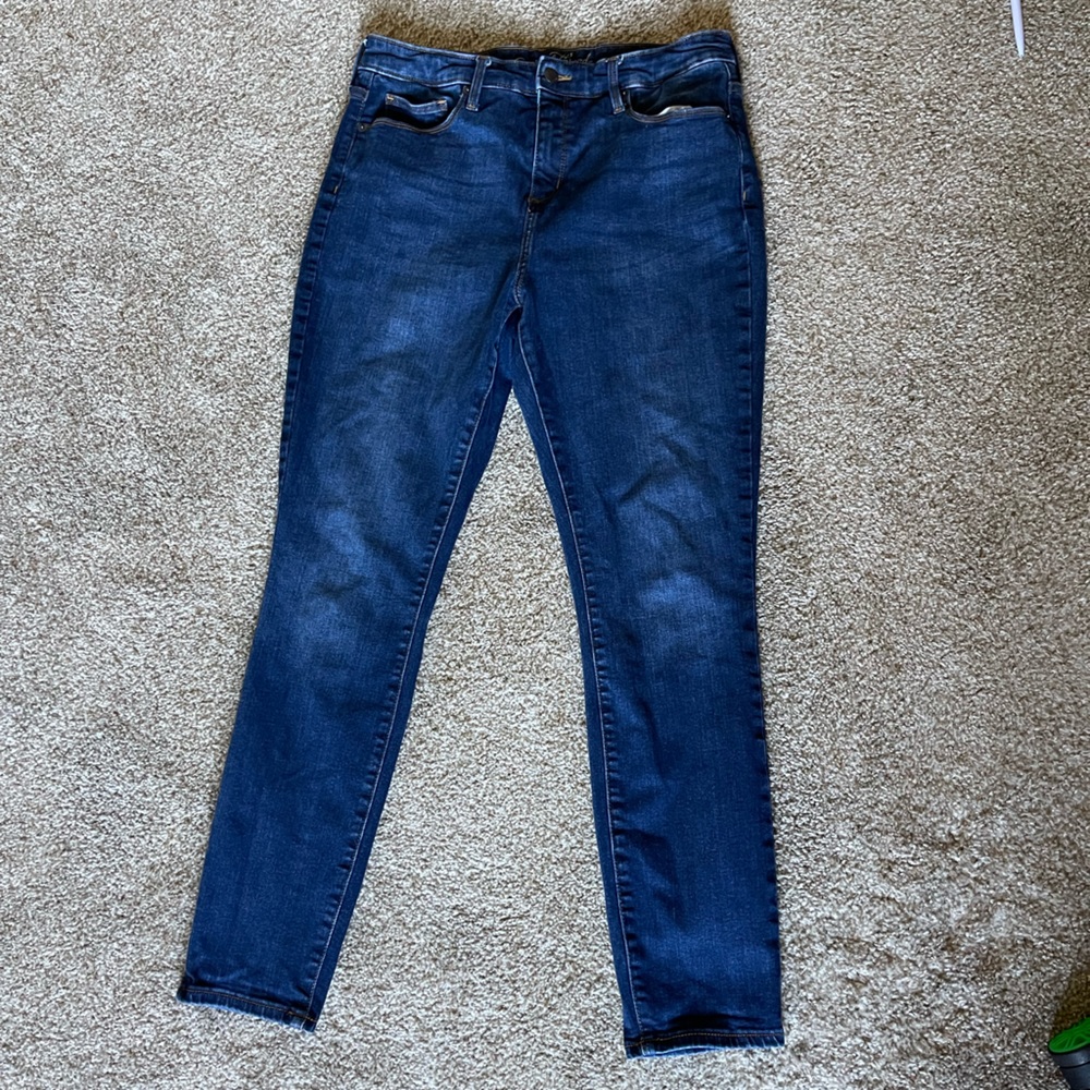 High- waisted skinny jeans